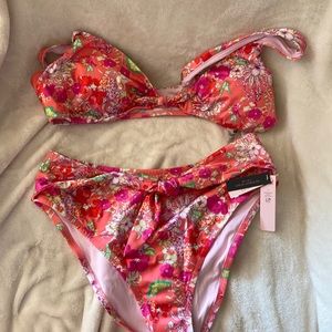 NWT Victoria’s Secret L floral swimsuit
